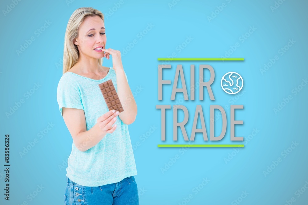 Blonde feeling guilty to eat bar of chocolate Blonde feeling guilty to eat bar of chocolate