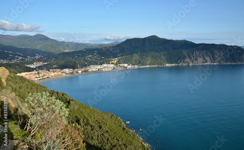 Ligurian landscape: hills, Mediterranean Sea, villages, Italy.
