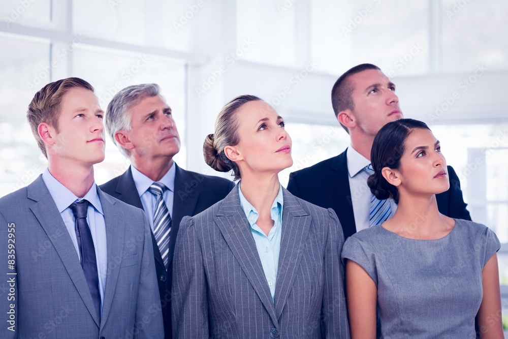 Business team looking up Business team looking up