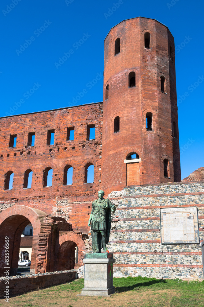 The statue of Giulio Cesare and the Palatine Towers in Turin