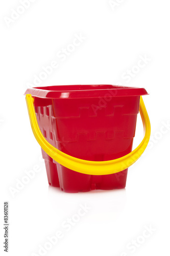 Red plastic bucket  isolated on white background