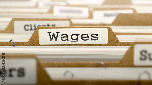 Wages Concept with Word on Folder.