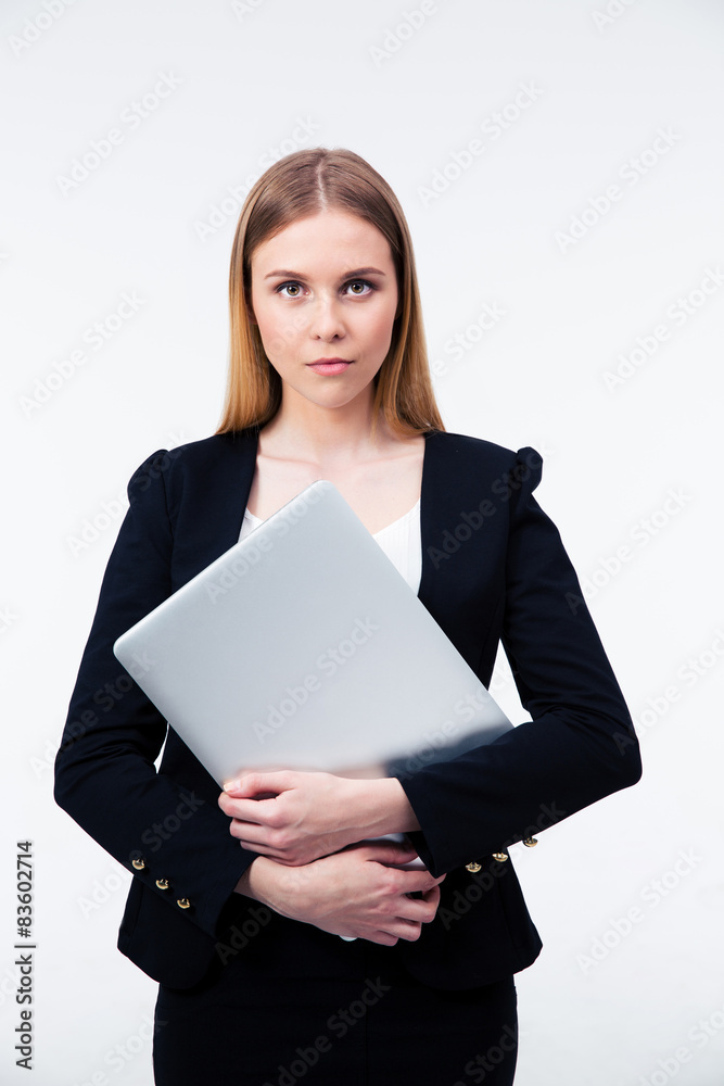 Beautiful businesswoman holding laptop Beautiful businesswoman holding laptop