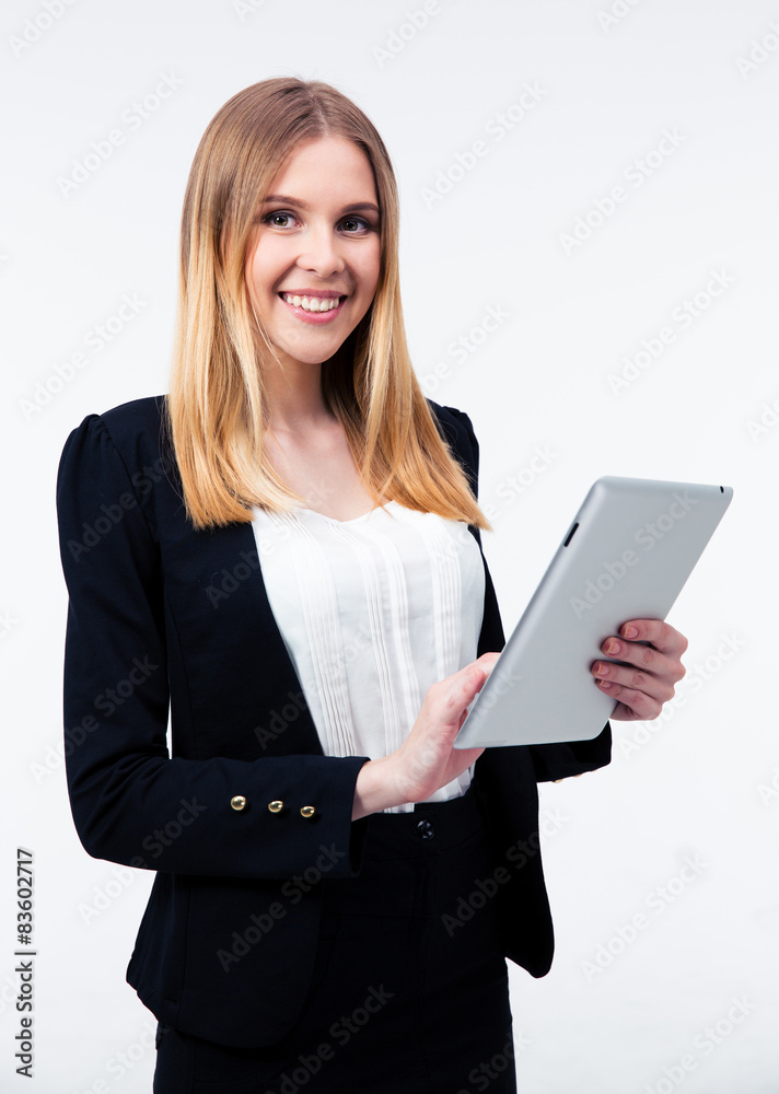 Smiling businesswoman using tablet computer Smiling businesswoman using tablet computer