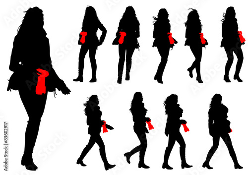 Silhouette girls with a camera on white background