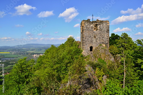Tower of castle ruins on a hill photo