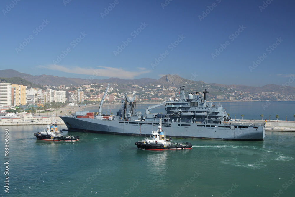 Mooring of military transport ship in port. Malaga, Spain