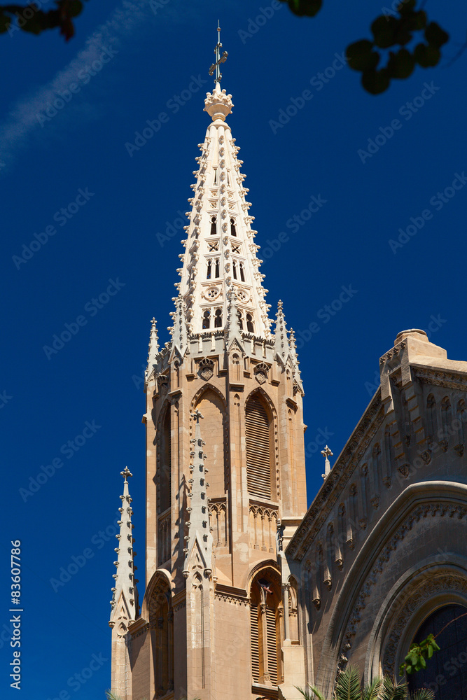 Fragment of the Old Catholic cathedral against the blue sky