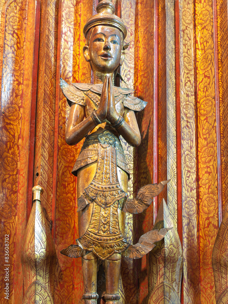 Fototapeta premium nice artwork of praying guardian angel in temple