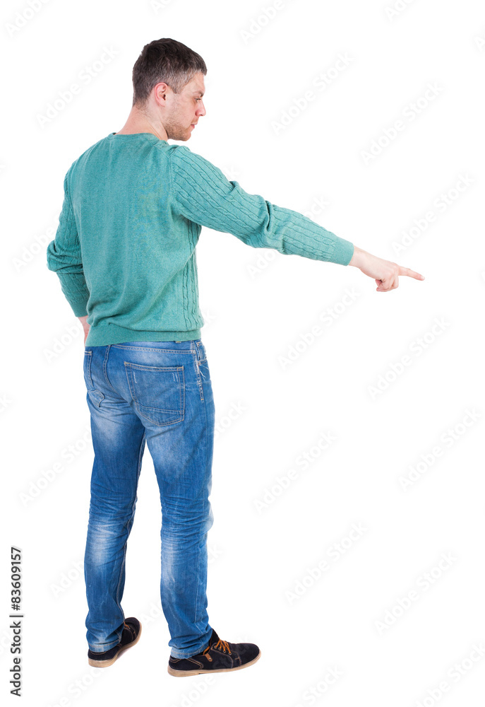 Back view of pointing young men in jeans. Back view of pointing young men in jeans.