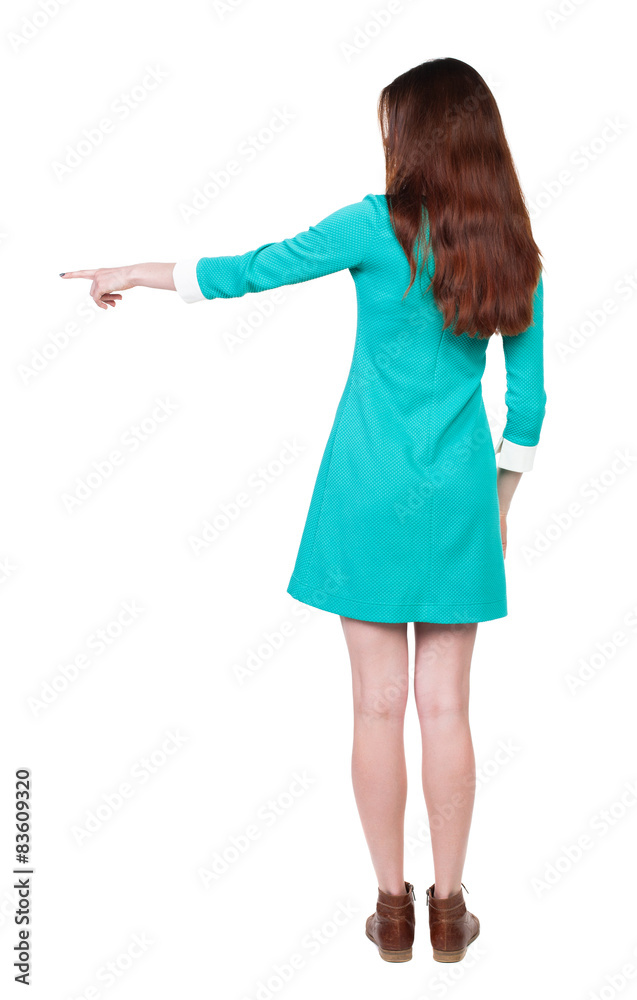 Back view of pointing woman Back view of pointing woman