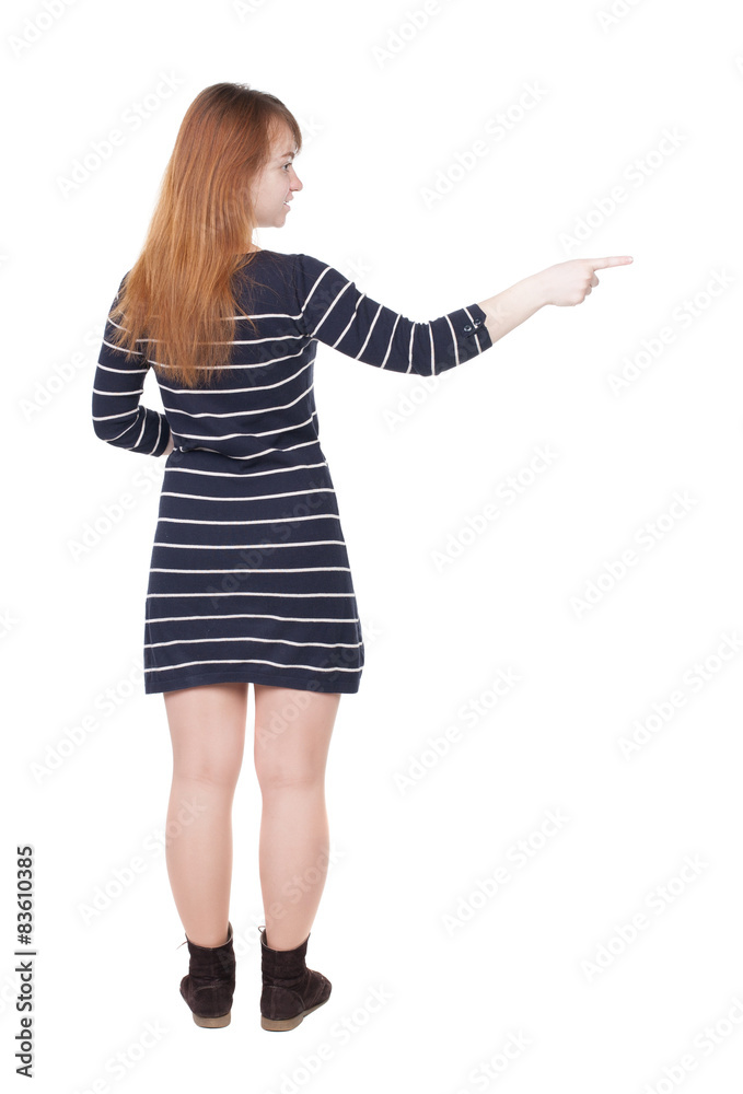 Back view of pointing woman Back view of pointing woman