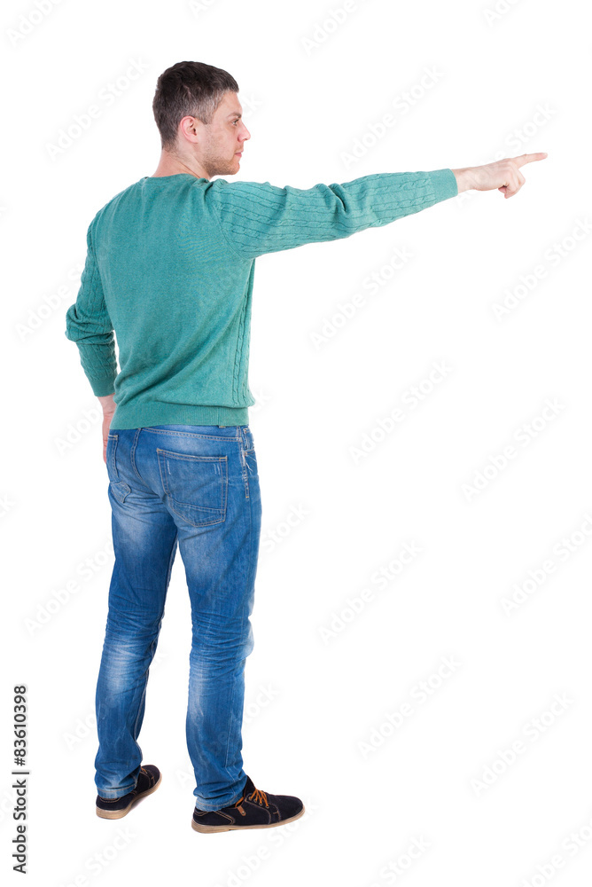 Back view of pointing young men in jeans. Back view of pointing young men in jeans.