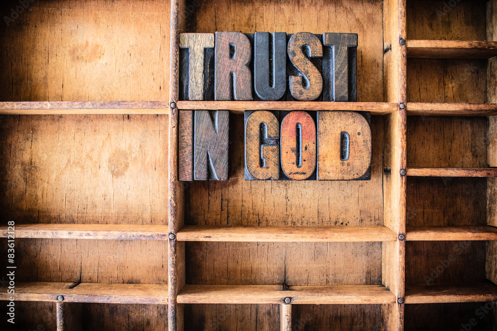 Obraz premium Trust in God Concept Wooden Letterpress Theme