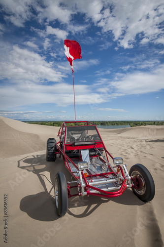 Red Dune Buggy in the sand dunes