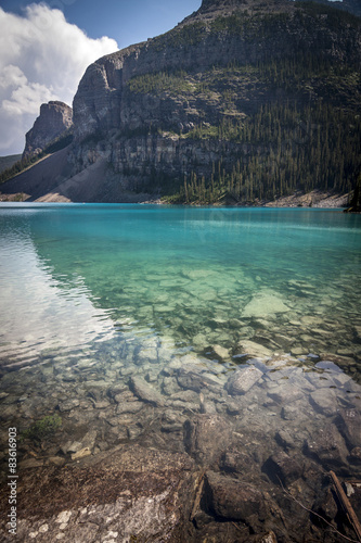 Crystal clear water of Moraine Lake near Banff Alberta