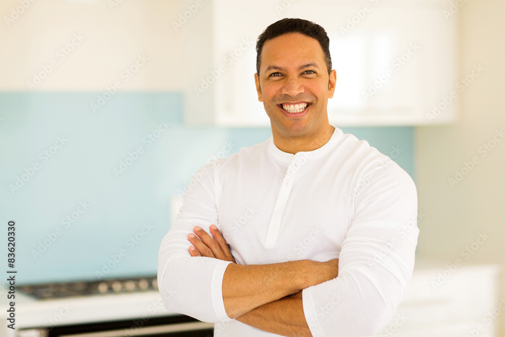 mid age man with arms crossed mid age man with arms crossed