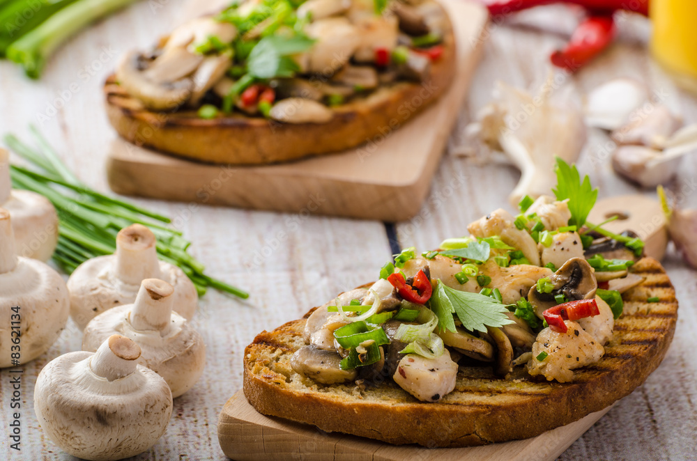 Toast with mushrooms and fried chicken, sprinkled with Toast with mushrooms and fried chicken, sprinkled with