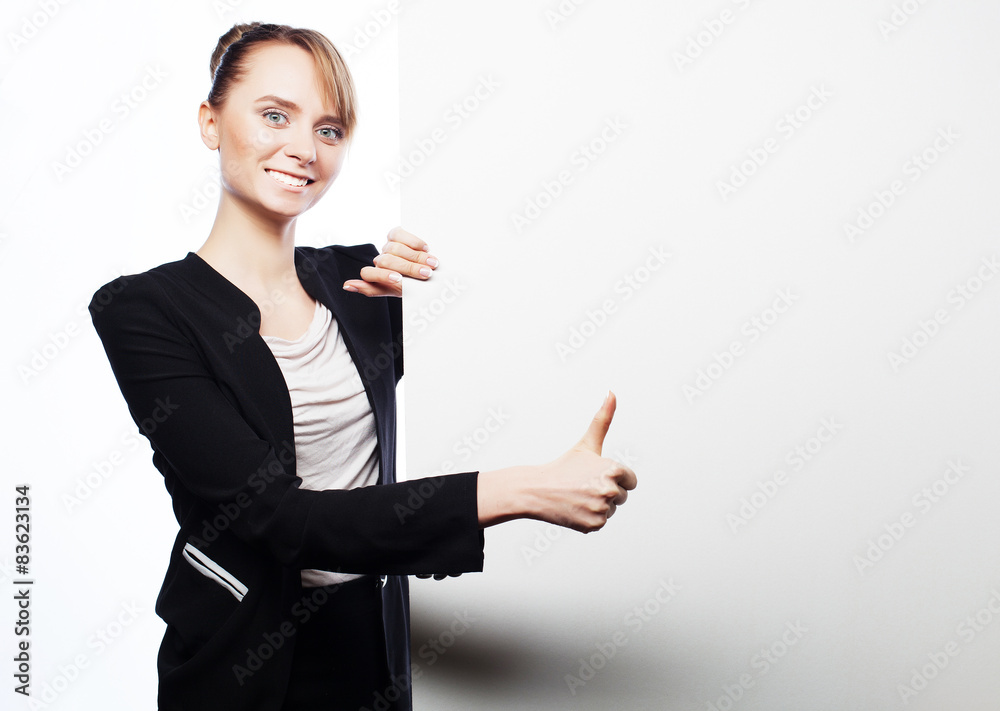 young business woman showing blank signboard young business woman showing blank signboard