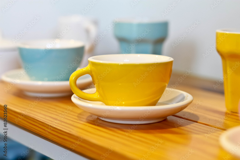 Coffee cup on  wooden shelf