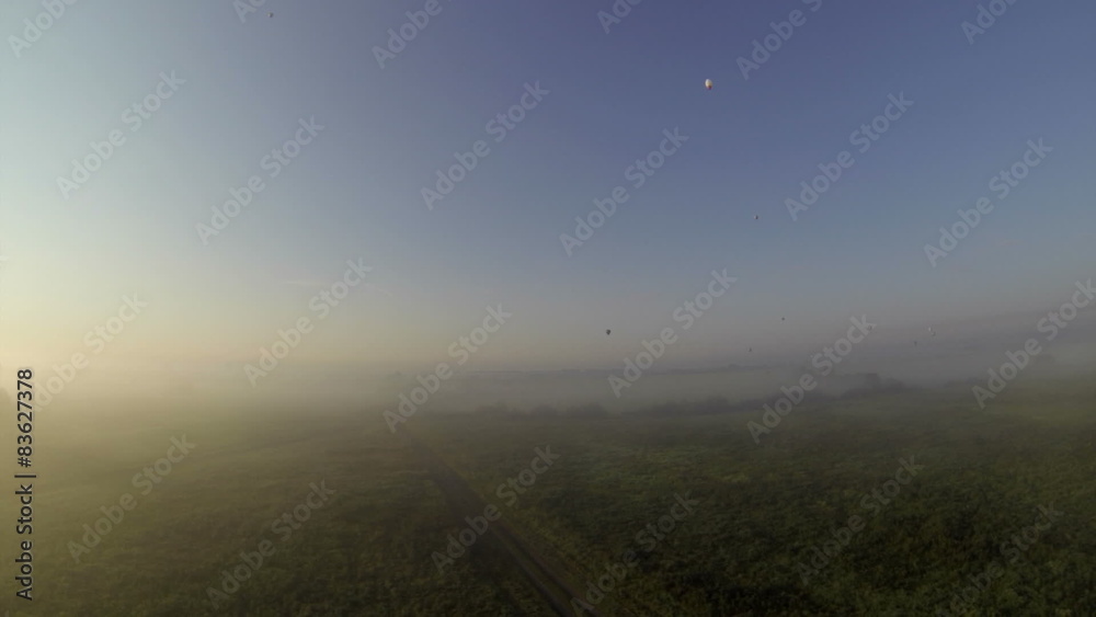 View from cockpit of balloon to morning landscape View from cockpit of balloon to morning landscape