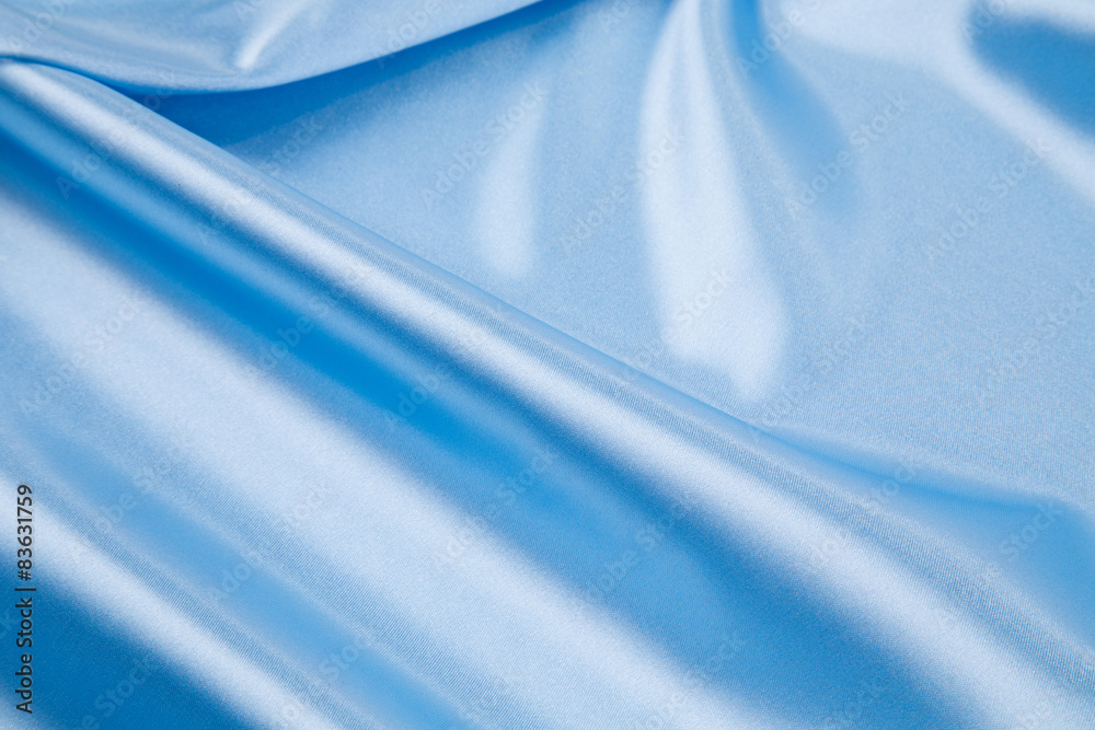 Fototapeta premium Blue silk drapery. 