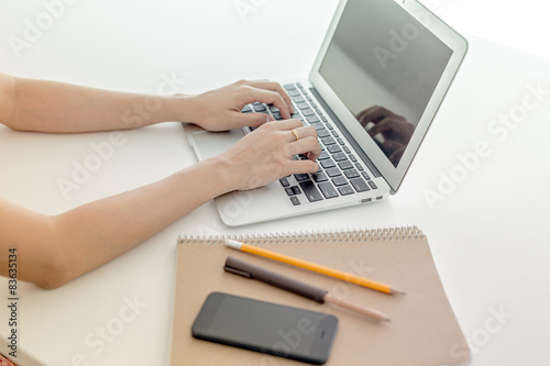 woman using her laptop