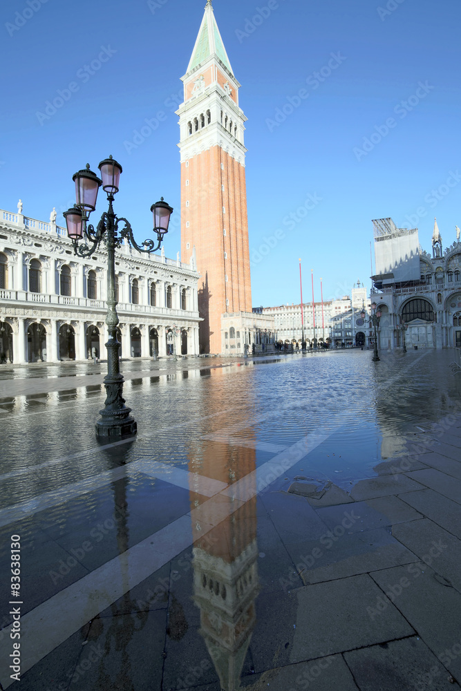 Campanile of Saint Mark in Venice with the high tide