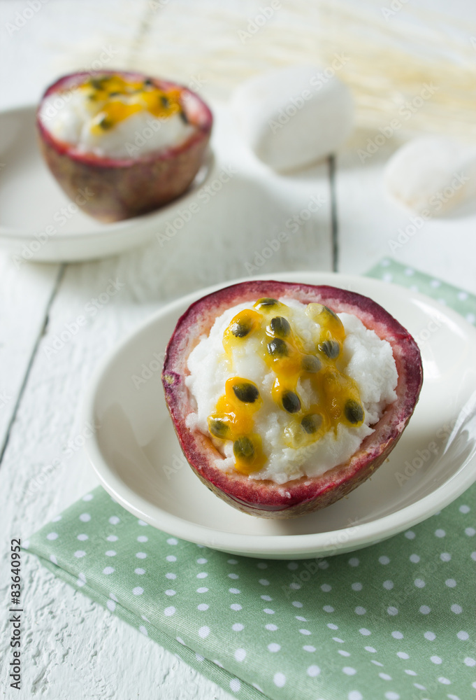 Milk ice cream with Passion fruit topping