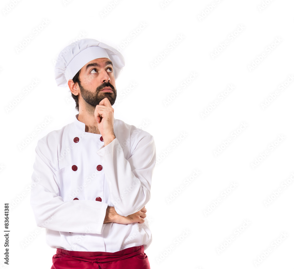 Chef thinking over white background