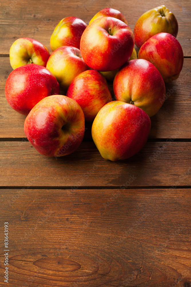 Fresh apples on the picnic table background Fresh apples on the picnic table background