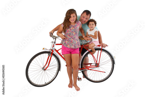 Fototapeta Naklejka Na Ścianę i Meble -  Family for retro riding bicycle