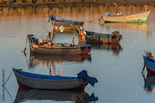 Old wooden fishing boats in...