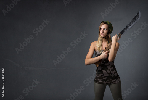 soldier looking with bayonet on hand photo