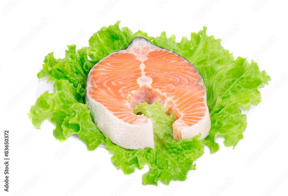 Fresh salmon steak on lettuce. Fresh salmon steak on lettuce.