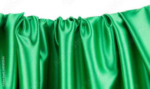 Green silk cloth with some folds.