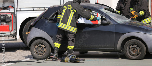 Firefighters freed the wounded by car accident sheet