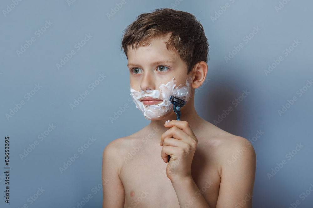the boy of the European appearance decade person shaves, shaving
