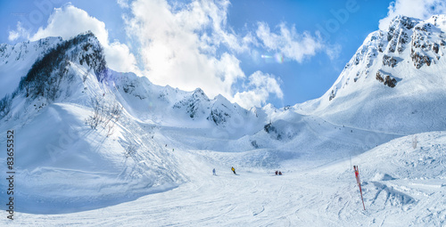 Canvas Print Krasnaya Polyana Sochi mountains snow ski sky descent speed