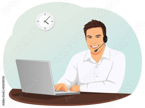 Call center operator with a headset is typing on the laptop