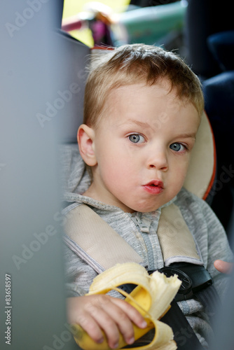  toddler boy  in the car