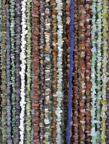Many necklaces of semiprecious stones