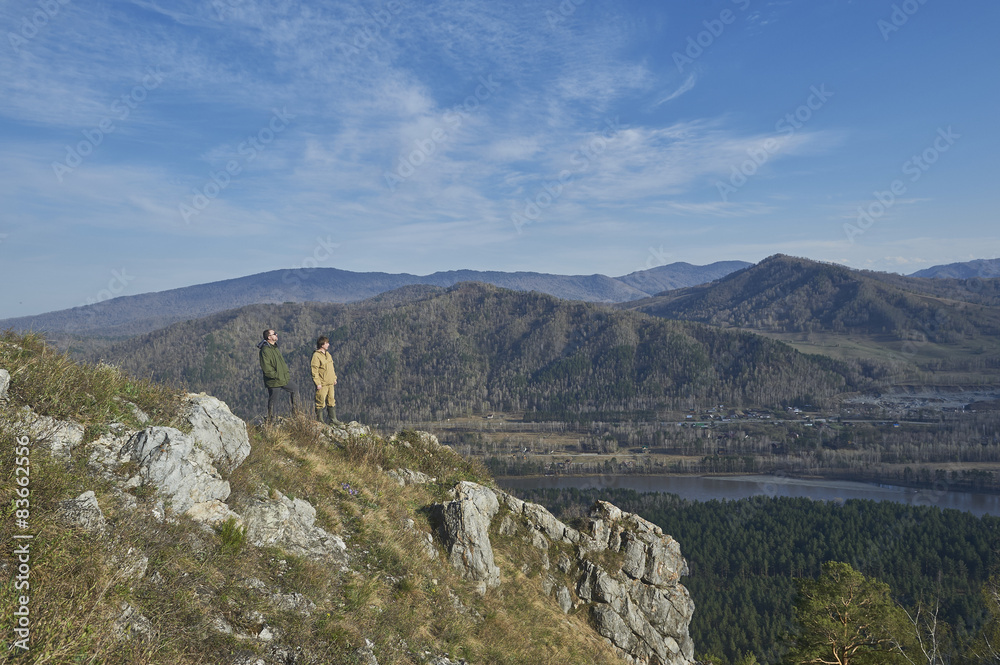 Two scientists standing on top of a hill in Altai