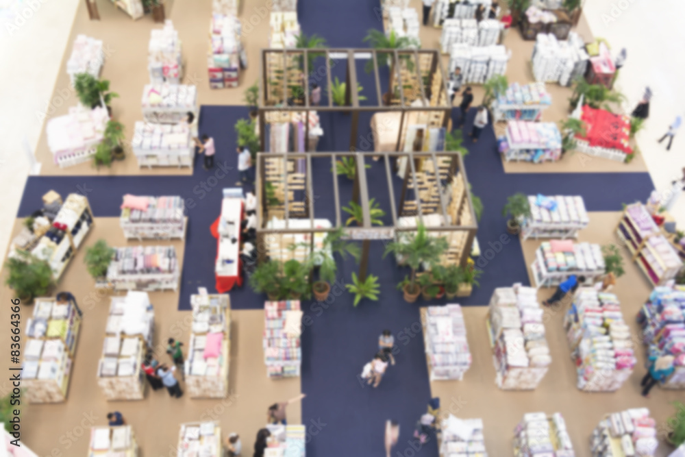 Blurred image of shopping mall and people . Blurred image of shopping mall and people .
