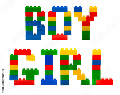 Boy and girl word build from toy building blocks