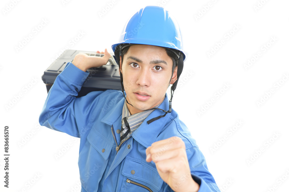 ガッツポーズの労働者