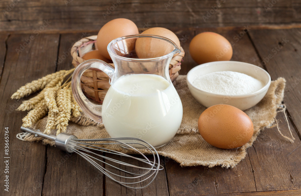 Milk, flour, wheat, whisk and eggs Milk, flour, wheat, whisk and eggs