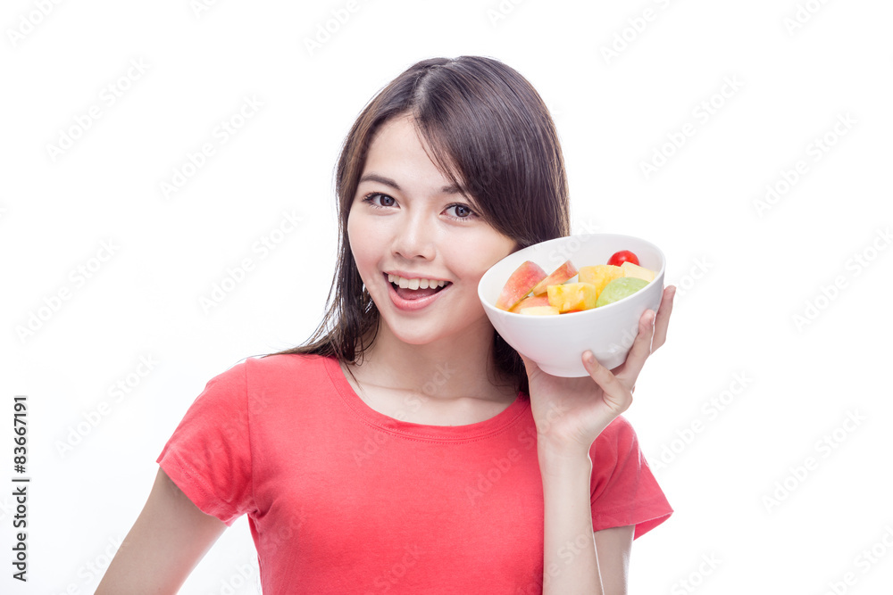 Asian woman holding bowl of fruit Asian woman holding bowl of fruit