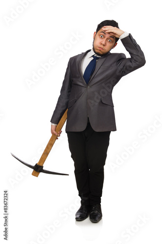 Young businessman holding a tool isolated on white © Elnur