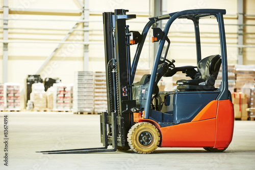 forklift loader stacker truck at warehouse